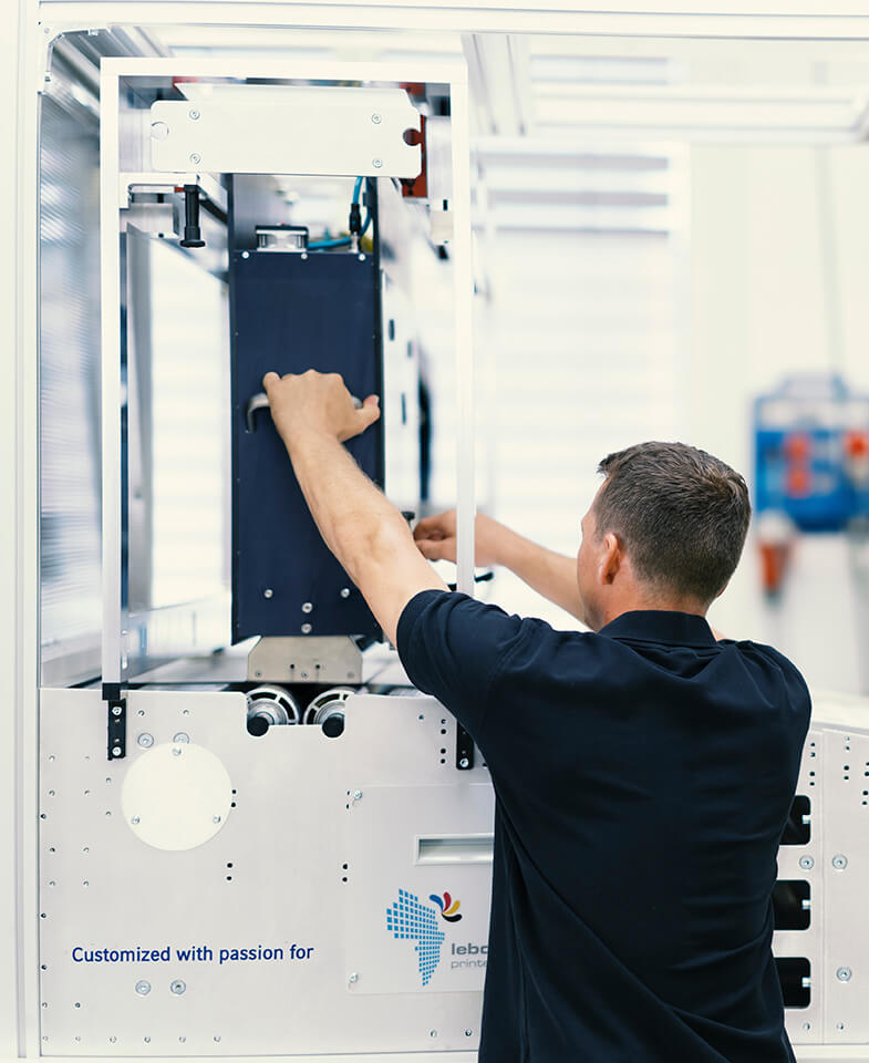 Service technician installing 42K Printbar System